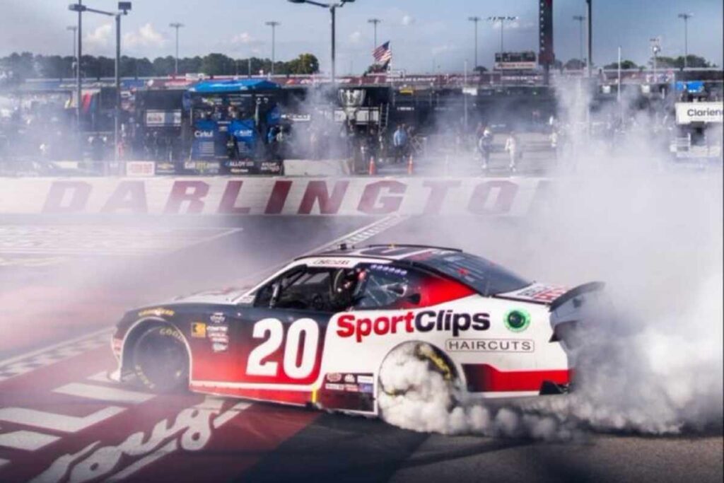 Car drifting at high speed on Irwindale Speedway.