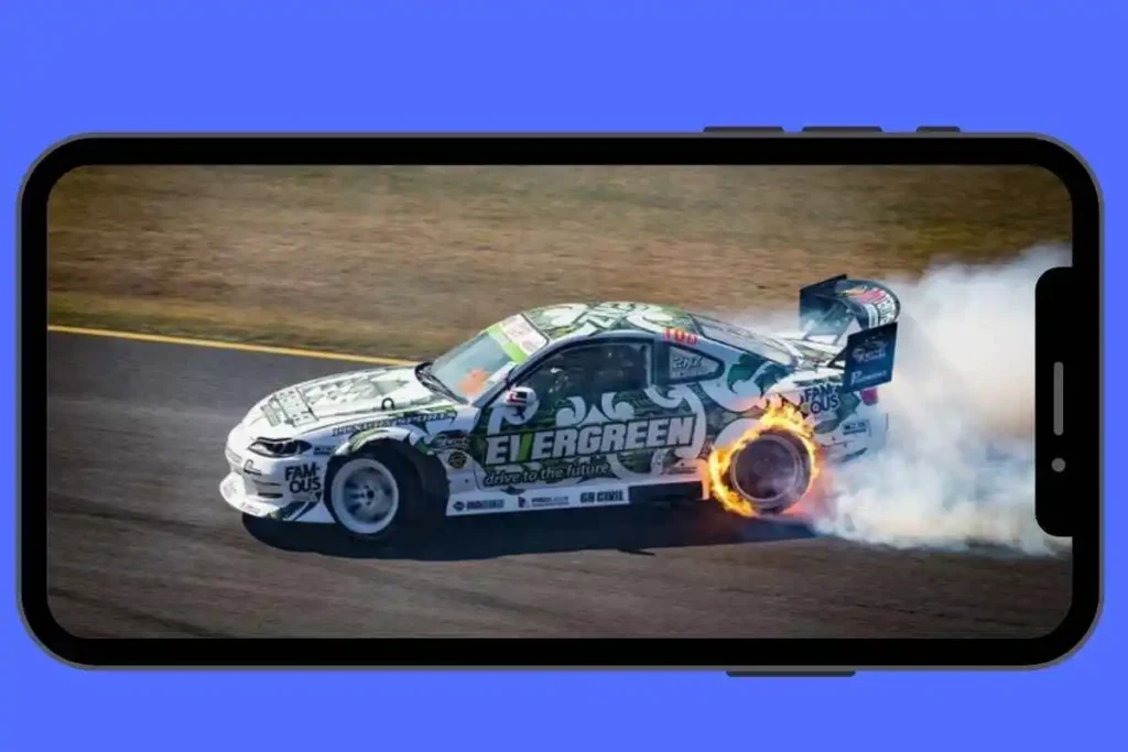 Nissan Silvia S13 drifting sideways through Ebisu Minami corner at 34-degree angle with smoke from rear tires in FR Legends Mod APK